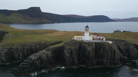 Neist-Point-Lighthouse-on-Steep-Cliff-Isle-of-Skye-Landscape-AERIAL