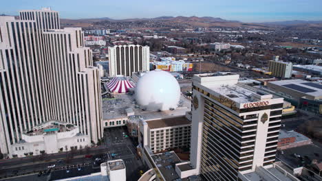 Downtown-Reno-Nevada-USA-Buildings-and-Casinos,-Establishing-Drone-Shot