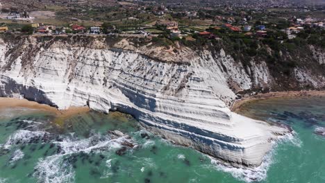 Orbiting-Drone-Shot-Above-Stair-of-the-Turks-in-Sicily,-Italy