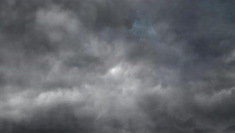 gray-clouds-and-lightning-storm,-background-video