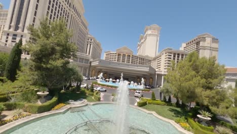 FPV-racing-drone-flying-around-Caesars-Palace-in-Las-Vegas,-America