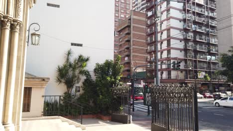 Panoramic-shot-at-rivadavia-avenue-bustling-traffic-of-flores-neighborhood-at-daylight-skyline-buenos-aires-city-argentina