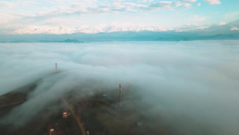 aerial-view-of-foggy-over-the-mountain-in-Nepal