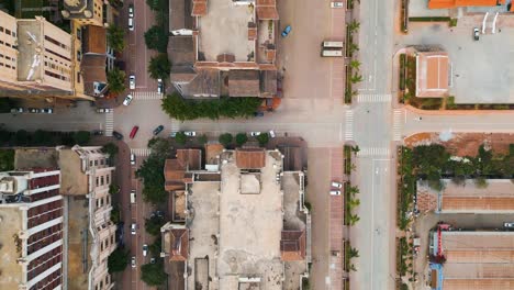 Top-down-view-of-Boten-Special-Economic-Zone-on-the-Laos-China-border,-showcasing-buildings-and-streets-with-traffic,-illustrating-the-concept-of-economic-development-and-international-trade