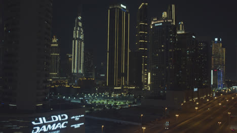 Dubai-Downtown-skyline-is-timelapse-with-towers-from-the-top-in-Dubai,-United-Arab-Emirates