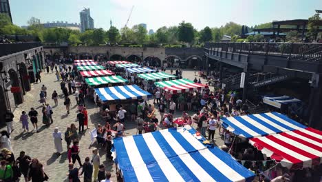 Footage-of-people-strolling-through-the-Saturday-market-at-Coal-Drops-Yard-in-Kings-Cross