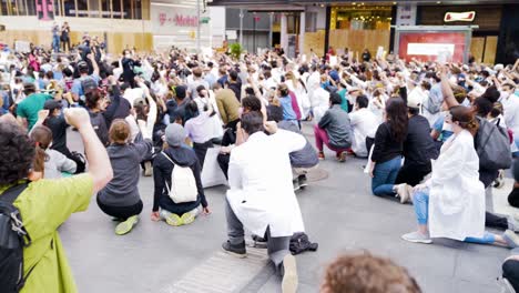 Doctors-and-medical-staff-kneel-in-Times-Square-in-a-Black-Lives-Matter-protest-to-honor-George-Floyd