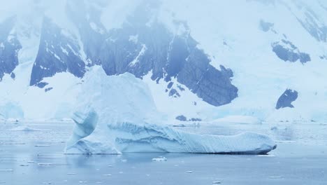 Antarctica-Iceberg-Mountains-and-Ocean,-Beautiful-Dramatic-Blue-Coastal-Landscape-and-Seascape-on-Antarctic-Peninsula-Coast,-Icy-Winter-Sea-Scene-with-Ice