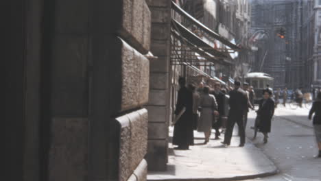 Busy-Street-in-Florence-During-the-1940s-Showing-Pedestrians-and-Tram