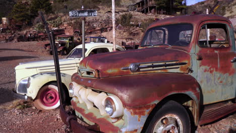 Rusty-Ford-Truck-and-Studebaker-Car-From-1940s,-Jerome-Ghost-Town,-Arizona-USA