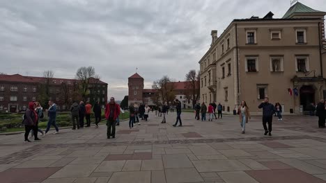 Walking-in-Wawel-Royal-Castle,-a-historic-castle-in-Krakow,-Poland-that-was-the-seat-of-Polish-kings