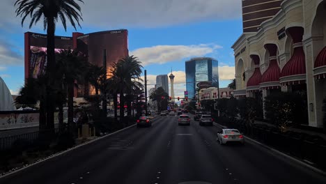 Las-Vegas-USA,-Evening-Traffic-on-Strip,-Driver's-POV-of-Resort-World-and-Fontainebleau-Casino-Hotels