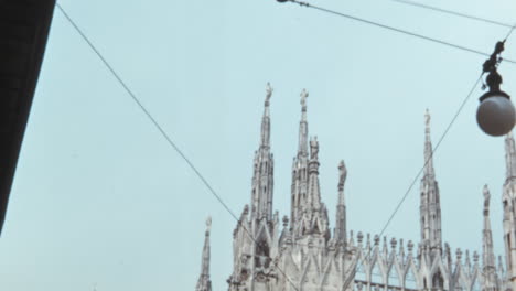 Gothic-Architecture-of-Milan-Cathedral-Under-a-Clear-Summer-Sky-of-1950s