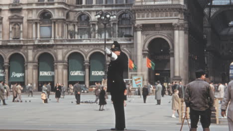 Traffic-Officer-Directs-Pedestrians-in-Front-of-Duomo-Museum-in-Milan-in-1950s