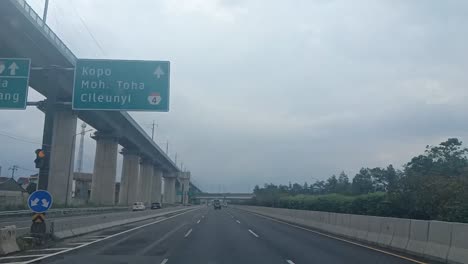 Highway-and-traffic-on-the-Cileunyi-toll-road,-Bandung,-Indonesia-in-slow-motion