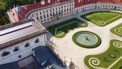 -Baroque-Style-Esterházy-Castle-with-Gardens-and-Fountain,-Fertőd,-Hungary