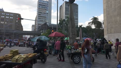 Exploring-crowded-Parque-Berrio-Metro-Station-in-Medellin,-Colombia,-busy-street