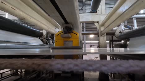 Inside-the-paper-mill,-paper-is-being-prepared-and-the-paper-is-being-checked