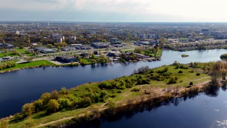 Riga,-Latvia,-Europe---The-Intriguing-Grāpju-Pussala-Also-Known-as-Grāpju-Island-is-Situated-in-the-Daugava-River---Drone-Flying-Forward