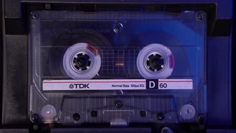 TDK-Audio-Cassette-Tape-Playing-or-Recording-Sound,-Close-Up