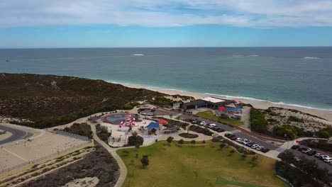 Wide-aerial-orbit-of-Lighthouse-Park-and-Amberton-Beach-in-Perth's-northern-suburbs