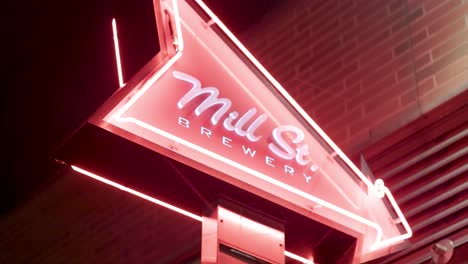 Glowing-Neon-Sign-outside-Brewery-at-Night-Along-a-street-in-Downtown-Toronto