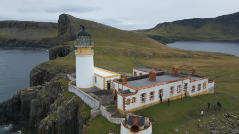 People-Visiting-Neist-Point-Lighthouse-on-Isle-of-Skye-Cliff-AERIAL