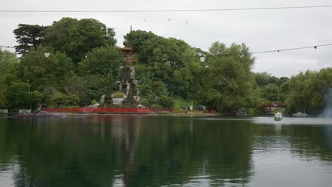 Battleships-manoeuvring-at-the-historical-naval-battle-reenactment,-Pesholm-Park,-Scarborough