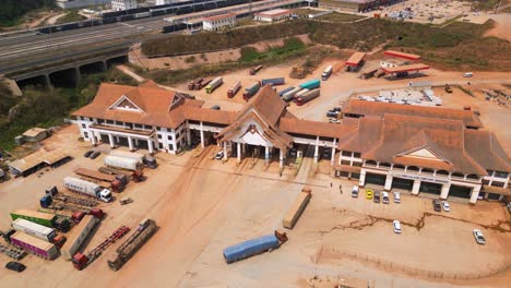 Aerial-shot-revealing-lorries-at-customs-in-the-Boten-Special-Economic-Zone