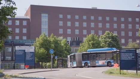 Traffic-flow-in-front-of-Karolinska-University-hospital-in-Stockholm-Sweden