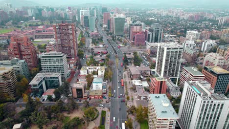 Aerial:-Apoquindo-Avenue,-Leading-To-The-Escuela-Militar-Subway-Station,-In-Las-Condes,-Chile