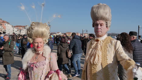 Venice,-Italy---February-18-2017-Carnival-mask-and-costume-poses-in-Saint-Mark's-square