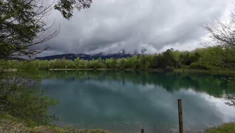 Bench-with-view-over-Turqoise-Lake-in-Spring