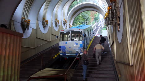 Funicular-railroad-in-Kyiv-city-Ukraine,-public-transport,-people-walking,-4K-shot