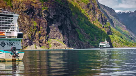 small-boat-moored-in-Flam-Bay,-on-Aurland-fjord