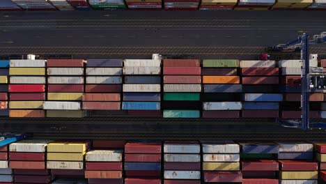 Overhead-Cranes-At-Work-Over-Stack-Of-Intermodal-Containers-At-The-Cargo-Terminal