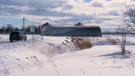 Strong-gusts-of-wind-and-snow,-snow-storm-in-the-rural-area-in-Canada,-static