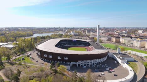 Aerial-approach-toward-iconic-landmark-Helsinki-Olympic-Stadium-in-Finland