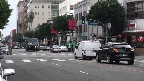 Downtown-Los-Angeles-Street-Traffic-on-Cloudy-Day,-Slow-Motion