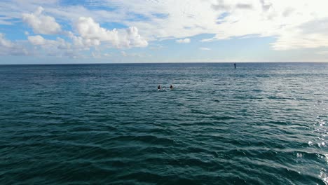 aerial-pullout-shot-of-two-canoes-paddling-to-shore