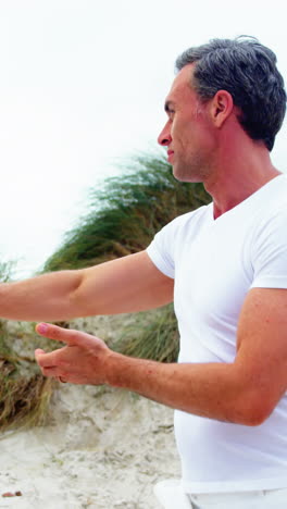 Mature-man-performing-stretching-exercise