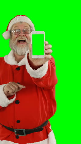 Weihnachtsmann-Benutzt-Mobiltelefon