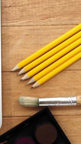 Close-up-of-laptop-with-various-stationery