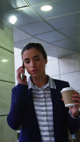 Businesswoman-talking-on-mobile-phone