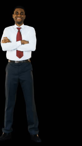 Businessman-standing-with-arms-crossed