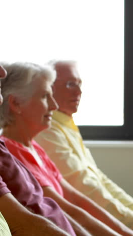 Senior-citizens-exercising-with-dumbbells