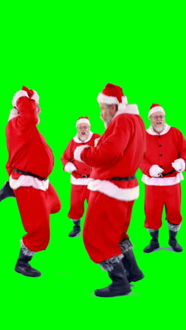 Grupo-De-Santa-Claus-Bailando