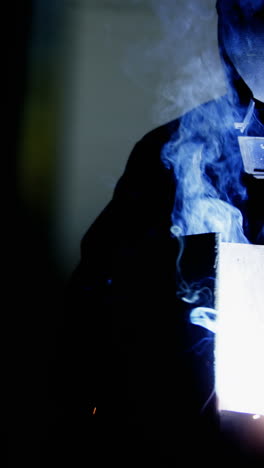 Welder-welding-a-metal