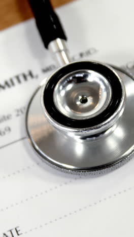 Close-up-of-paper-with-stethoscope