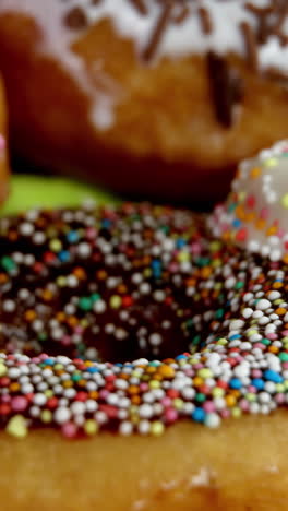 Close-up-of-tasty-doughnuts-with-sprinkles